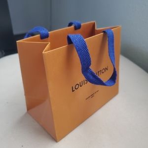 Mini LV shopping bag for jewelry or small leather goods.